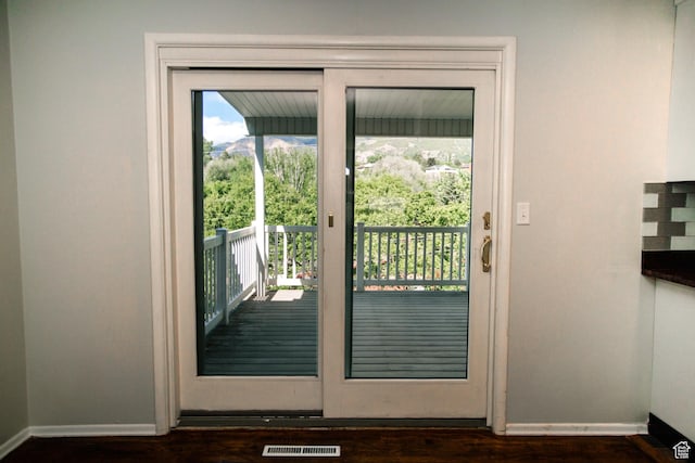 4872 S Burch Creek Dr, South Ogden, UT 84403 - doorway with baseboards and dark wood finished floors