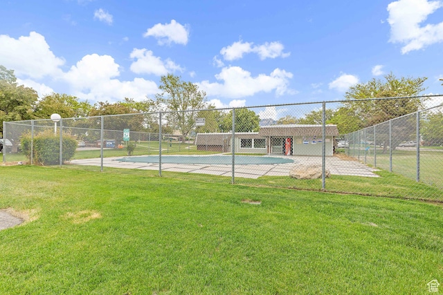 view of tennis court with community basketball court