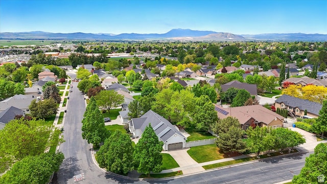 aerial view of residential area with mountains