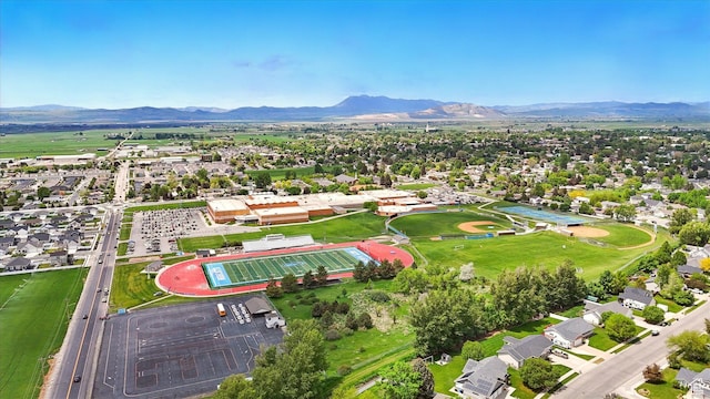 aerial perspective of suburban area with a mountainous background