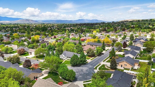 aerial view of residential area with a mountainous background