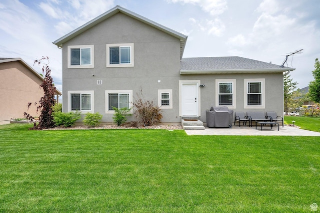 616 W Northlake Dr, Lehi, UT 84043 - rear view of house featuring a patio, a lawn, and stucco siding