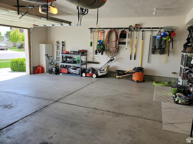 garage featuring a garage door opener