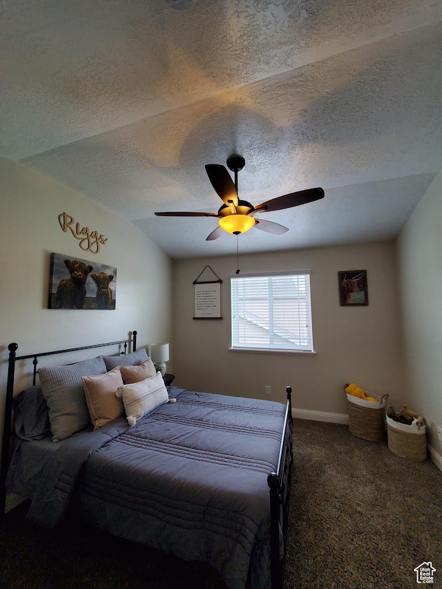 bedroom featuring carpet flooring, a textured ceiling, baseboards, and a ceiling fan