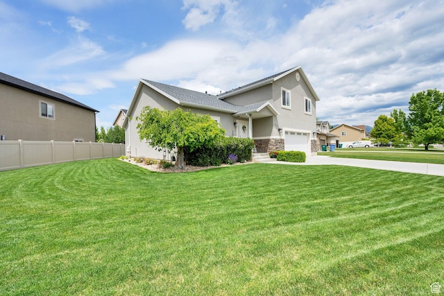 616 W Northlake Dr, Lehi, UT 84043 - view of front of property featuring a garage, driveway, stucco siding, and stone siding