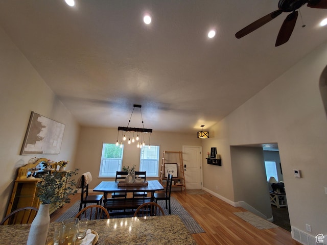 dining area featuring a ceiling fan, baseboards, wood finished floors, and recessed lighting