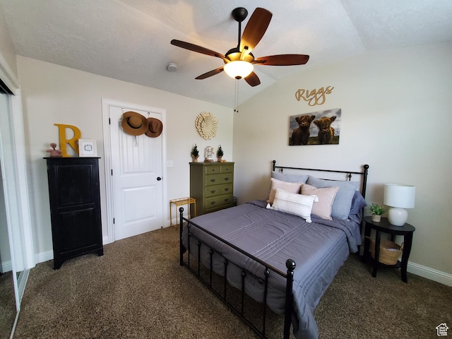 bedroom with vaulted ceiling, carpet, a ceiling fan, and baseboards