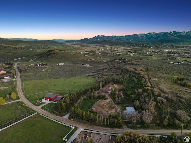 8819 Highfield Rd Unit 61, Park City, UT 84098 - aerial view of property and surrounding area featuring a mountain backdrop and rural landscape