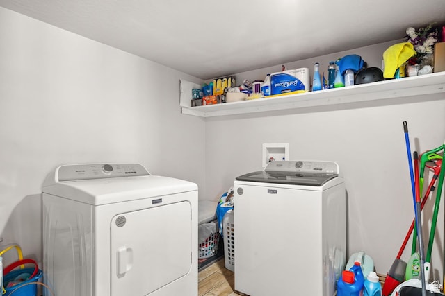 2521 W Ridgeline Rd, Stockton, UT 84071 - laundry room featuring washing machine and dryer and light wood-style floors