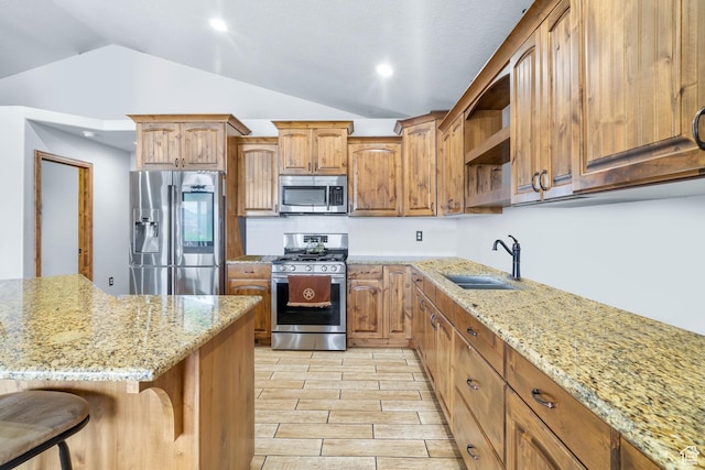 2521 W Ridgeline Rd, Stockton, UT 84071 - kitchen with appliances with stainless steel finishes, a sink, lofted ceiling, light stone counters, and open shelves