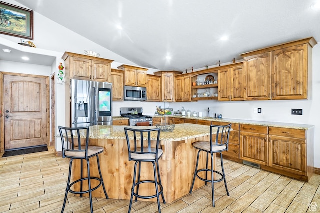 2521 W Ridgeline Rd, Stockton, UT 84071 - kitchen featuring stainless steel appliances, vaulted ceiling, open shelves, wood tiled floors, and brown cabinetry