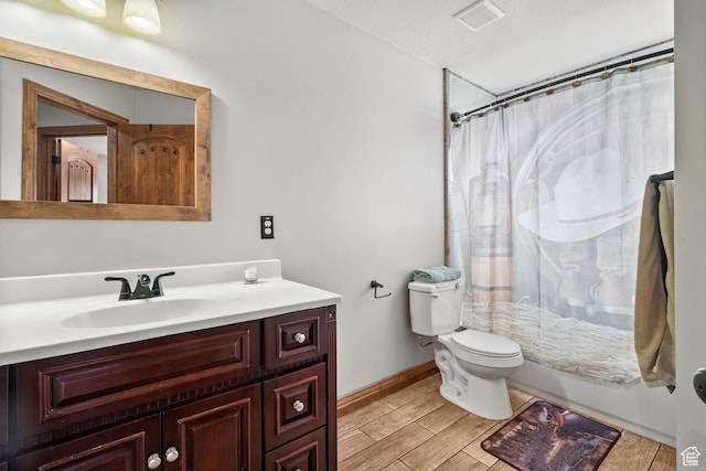 2521 W Ridgeline Rd, Stockton, UT 84071 - full bathroom with a shower with curtain, vanity, toilet, and baseboards
