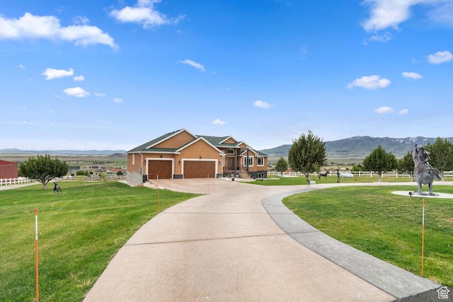 2521 W Ridgeline Rd, Stockton, UT 84071 - view of front of property with a mountain view, concrete driveway, and a garage