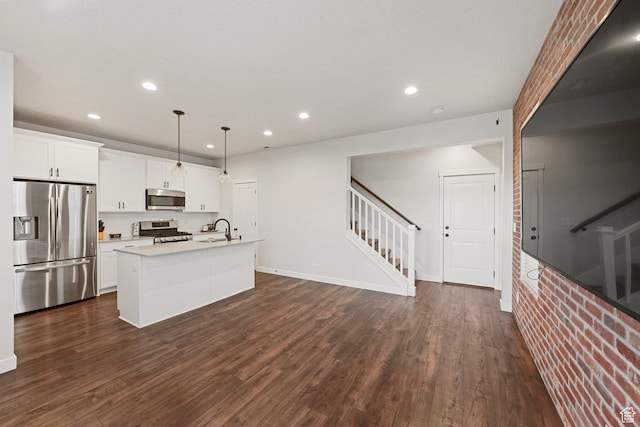 11413 S Kitty Hawk Rd W, South Jordan, UT 84009 - kitchen featuring stainless steel appliances, an island with sink, recessed lighting, a sink, and light countertops