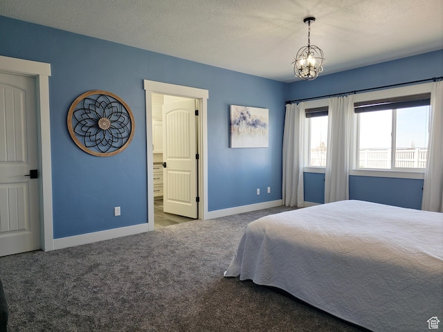 123 Red Hawk Ave, Evanston, WY 82930 - bedroom featuring carpet floors, baseboards, a chandelier, and a textured ceiling