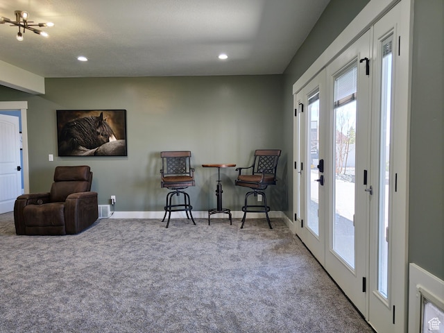 123 Red Hawk Ave, Evanston, WY 82930 - sitting room with carpet, plenty of natural light, baseboards, and recessed lighting