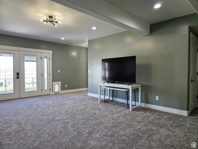 123 Red Hawk Ave, Evanston, WY 82930 - unfurnished living room with carpet floors, baseboards, recessed lighting, and french doors