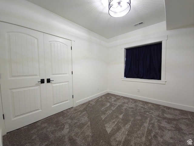 123 Red Hawk Ave, Evanston, WY 82930 - unfurnished bedroom featuring carpet, baseboards, and a closet