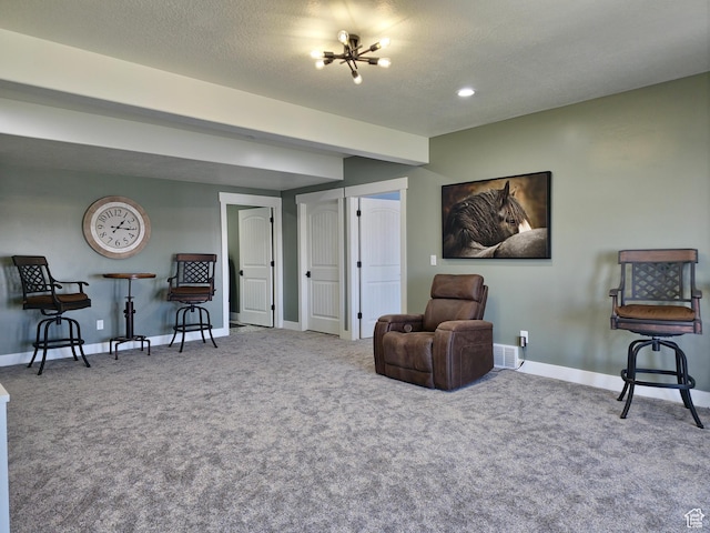 123 Red Hawk Ave, Evanston, WY 82930 - sitting room with carpet, baseboards, a textured ceiling, and recessed lighting