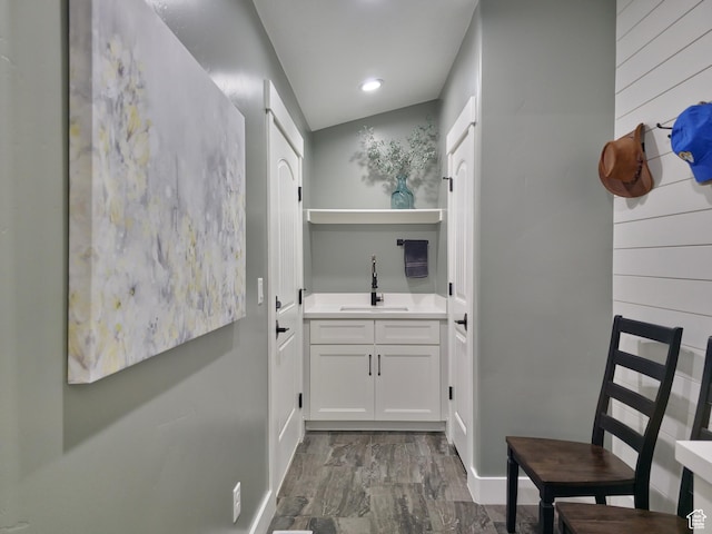 123 Red Hawk Ave, Evanston, WY 82930 - bar area with a sink, baseboards, and recessed lighting