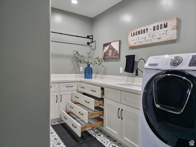 123 Red Hawk Ave, Evanston, WY 82930 - clothes washing area featuring washer / clothes dryer, cabinet space, and recessed lighting