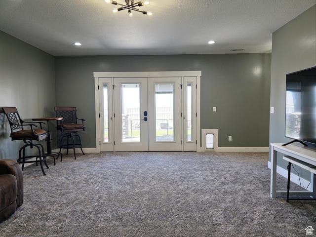 123 Red Hawk Ave, Evanston, WY 82930 - living area with carpet floors, recessed lighting, baseboards, a chandelier, and a textured ceiling
