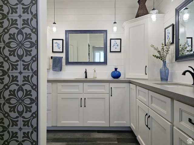 123 Red Hawk Ave, Evanston, WY 82930 - full bathroom featuring vanity and wood finished floors