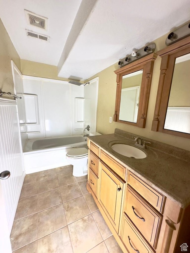 full bathroom with tile patterned floors, toilet, shower / washtub combination, and vanity