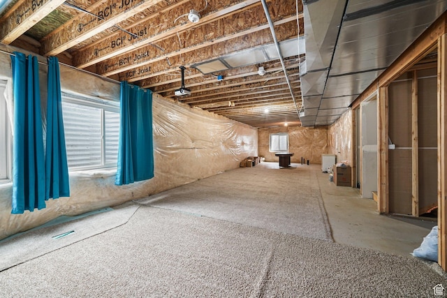 basement featuring plenty of natural light