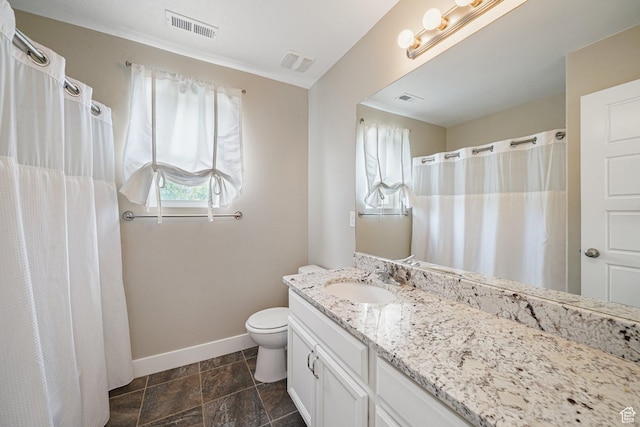 full bathroom featuring baseboards, vanity, and toilet