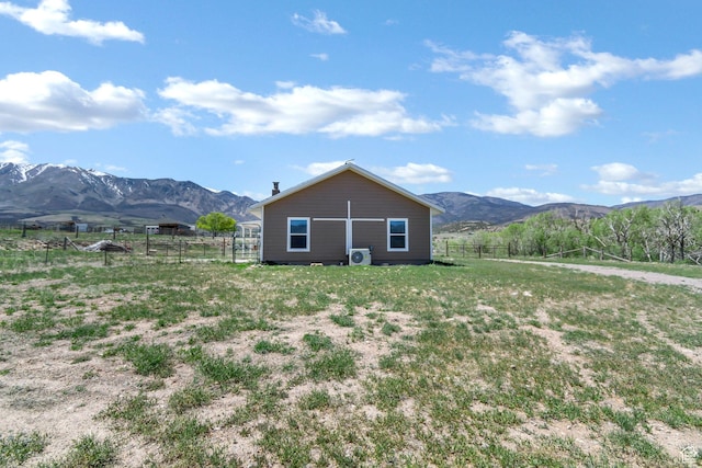 1665 S Kennedy Dr, Marysvale, UT 84750 - rear view of property with a mountain view, fence, and a rural view