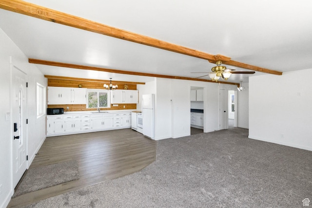 1665 S Kennedy Dr, Marysvale, UT 84750 - unfurnished living room featuring a chandelier, a sink, baseboards, beam ceiling, and ceiling fan