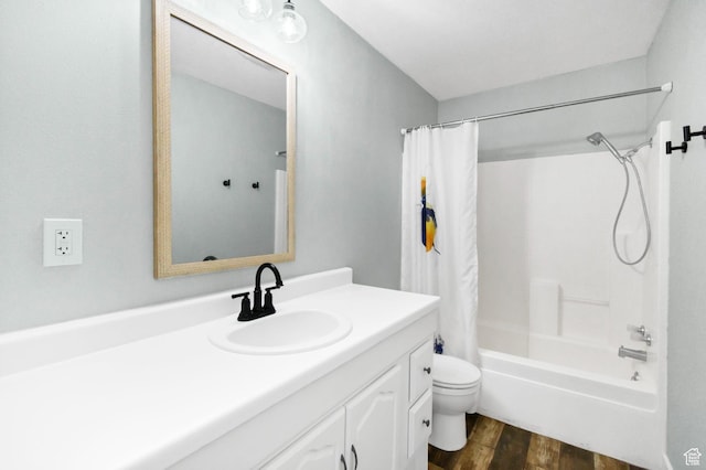 1665 S Kennedy Dr, Marysvale, UT 84750 - full bathroom with wood finished floors, toilet, vanity, and shower / tub combo with curtain