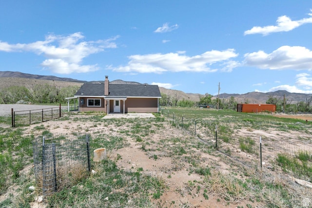 1665 S Kennedy Dr, Marysvale, UT 84750 - back of property featuring a mountain view, a rural view, and fence