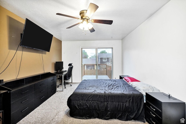 910 W 370 S, Logan, UT 84321 - bedroom featuring carpet floors, access to outside, a desk, and a ceiling fan