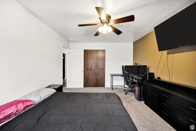 910 W 370 S, Logan, UT 84321 - carpeted bedroom featuring a desk, a ceiling fan, and a closet