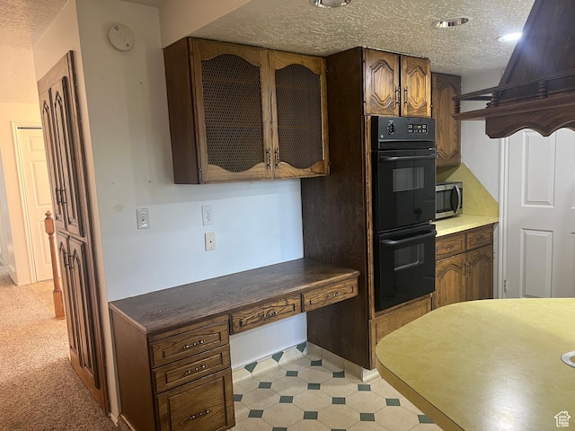 7420 S 1025 E, South Weber, UT 84405 - kitchen with stainless steel microwave, a textured ceiling, and glass insert cabinets