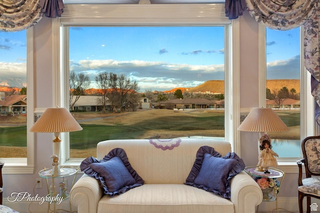 living room featuring golf course view