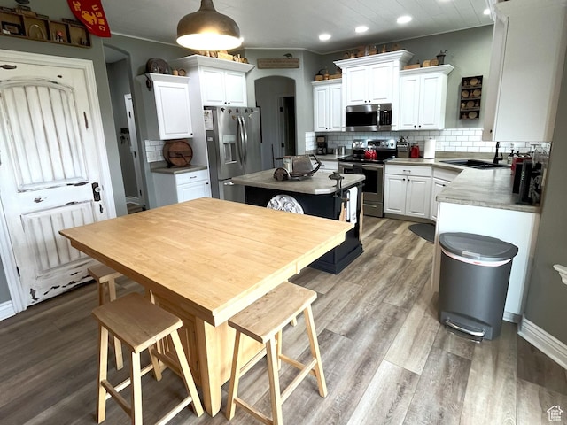 358 E 2970 S, Naples, UT 84078 - kitchen with appliances with stainless steel finishes, backsplash, white cabinetry, and recessed lighting