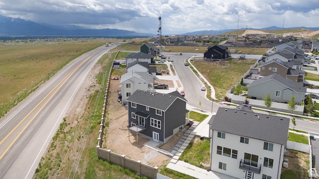 aerial perspective of suburban area with a mountain backdrop