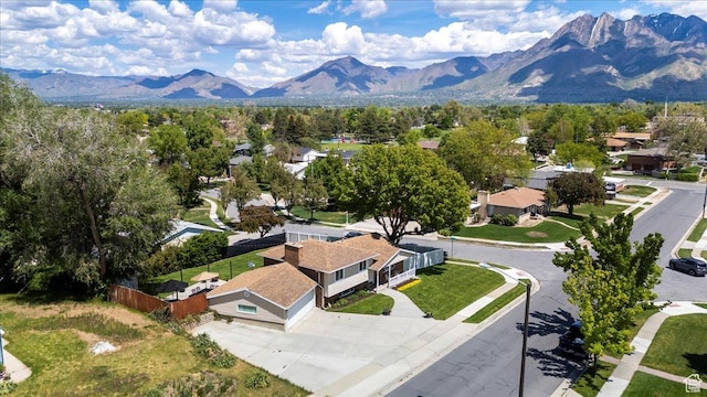 aerial view of residential area with a mountainous background