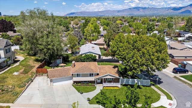 aerial view of residential area with mountains