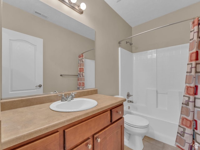 bathroom featuring toilet, tile patterned flooring, vanity, and shower / bathtub combination with curtain