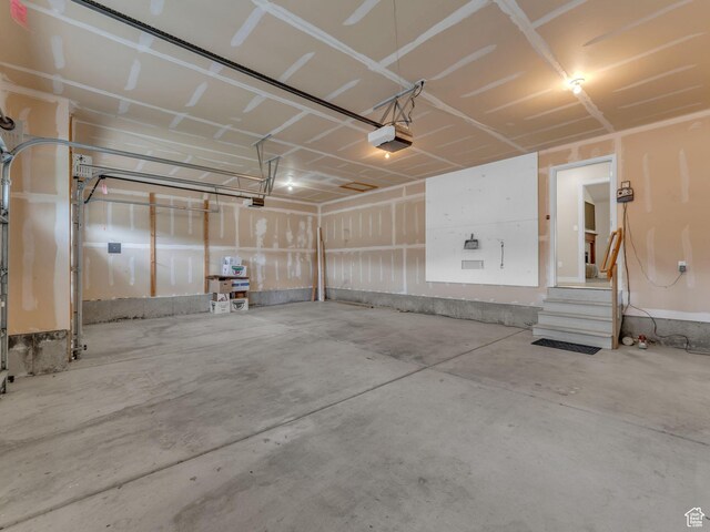 garage featuring a garage door opener