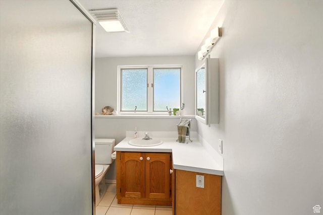 634 W 600 N, Brigham City, UT 84302 - bathroom featuring toilet, tile patterned flooring, and vanity