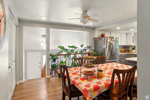 634 W 600 N, Brigham City, UT 84302 - dining room with a ceiling fan, light wood-style floors, recessed lighting, and baseboards