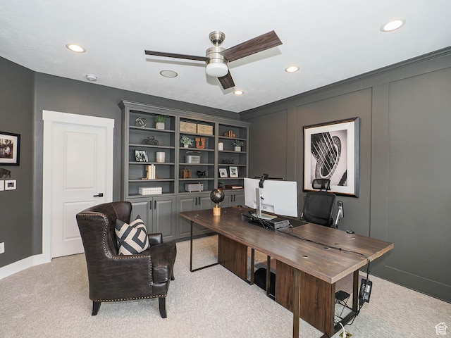 home office featuring light colored carpet, recessed lighting, baseboards, and a ceiling fan