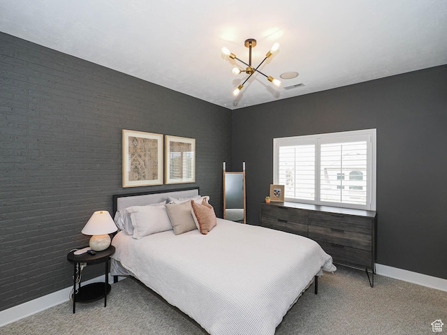 bedroom featuring a chandelier, baseboards, and light carpet