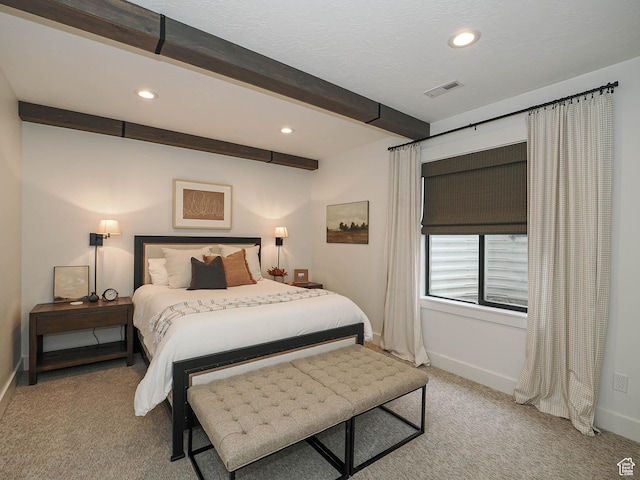 bedroom featuring baseboards, light colored carpet, recessed lighting, and beam ceiling