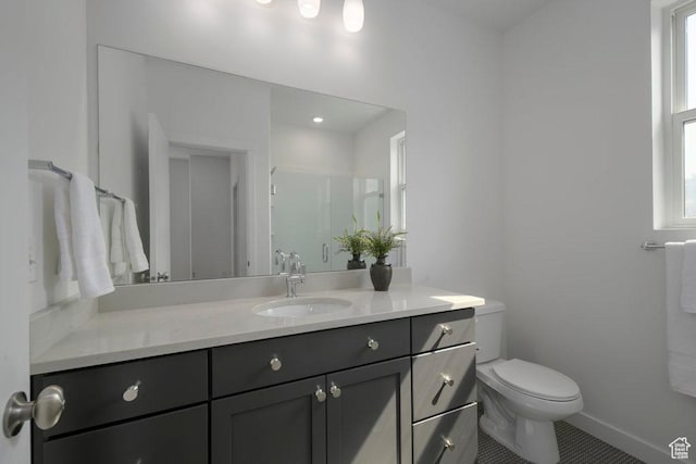 441 N Bishop Pl Unit 4-17, Salt Lake City, UT 84103 - full bathroom with toilet, vanity, a stall shower, baseboards, and tile patterned floors